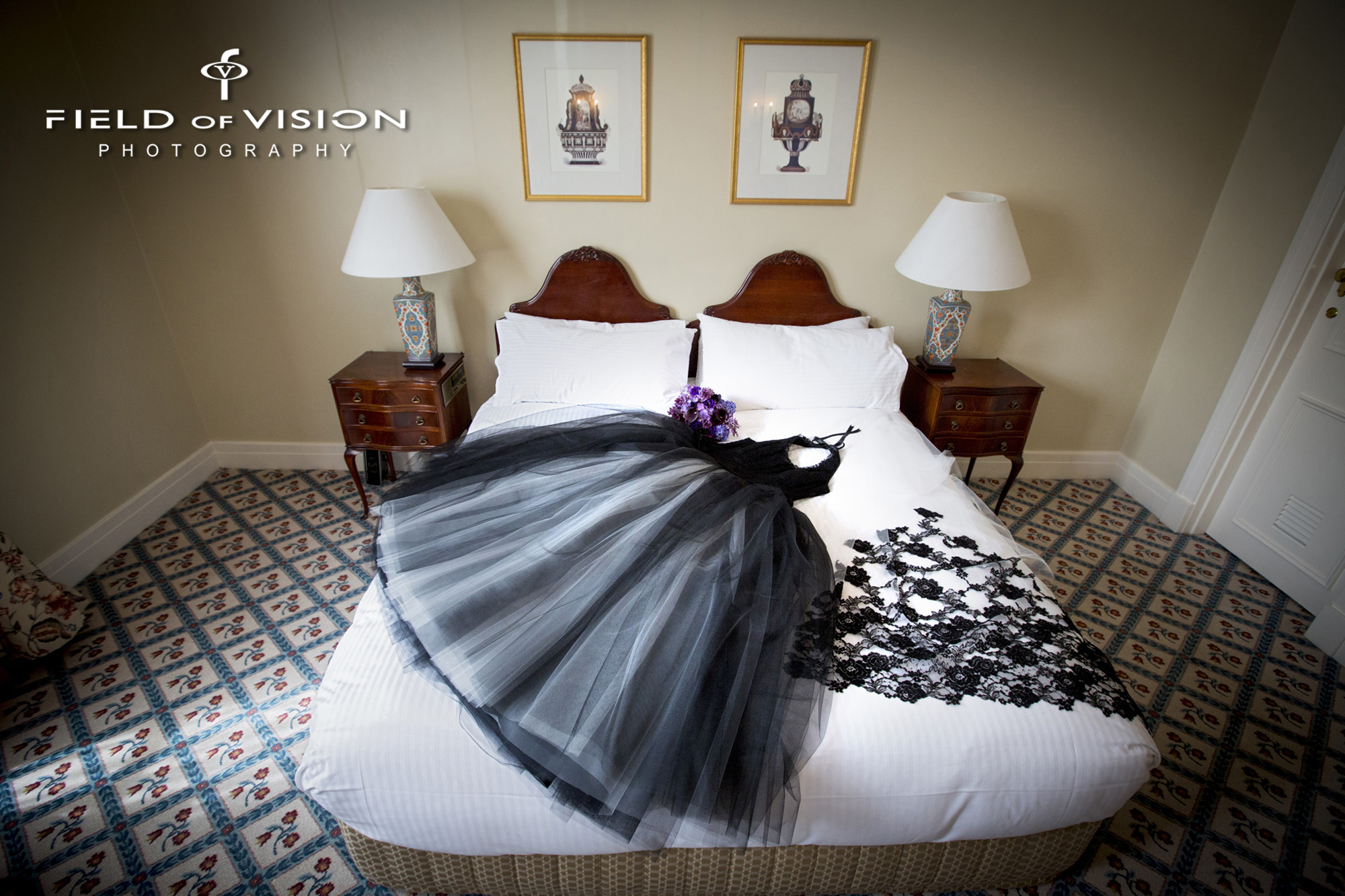Vanyanis gothic wedding gown and lace veil on bed © Field of Vision