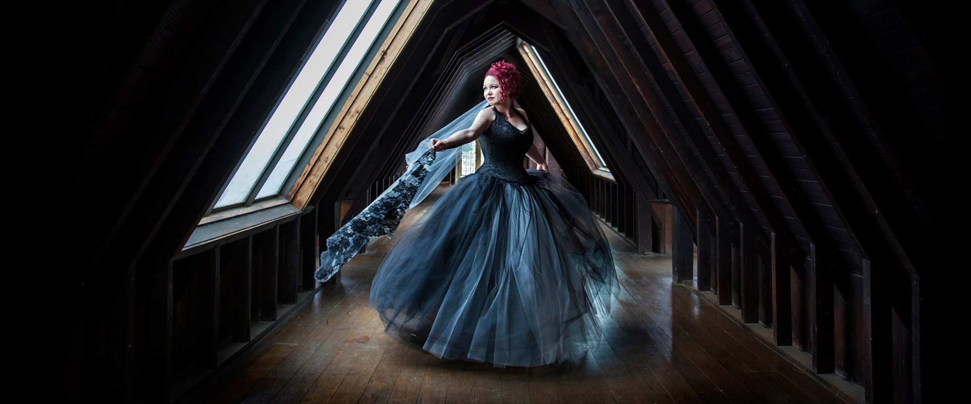 Gothic bride spins in attic window. Photography © Field of Vision